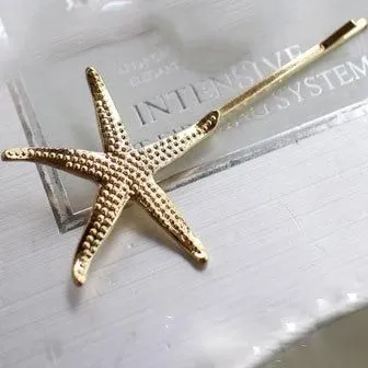 01 Earrings H316 Gold Star Fish Hair Clip