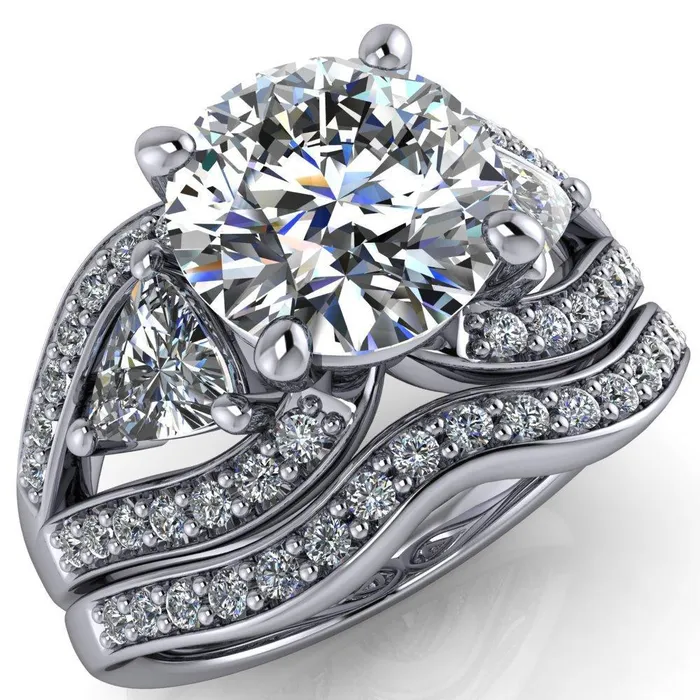 Rings Kassandra Round Center Stone 4 Prong Trillion Moissanite Side Split Shank Accent Engagement Ring Fire Brilliance Rings Kassandra Round Center Stone 4 Prong Trillion Moissanite Side Split Shank Accent Engagement Ring Fire Brilliance